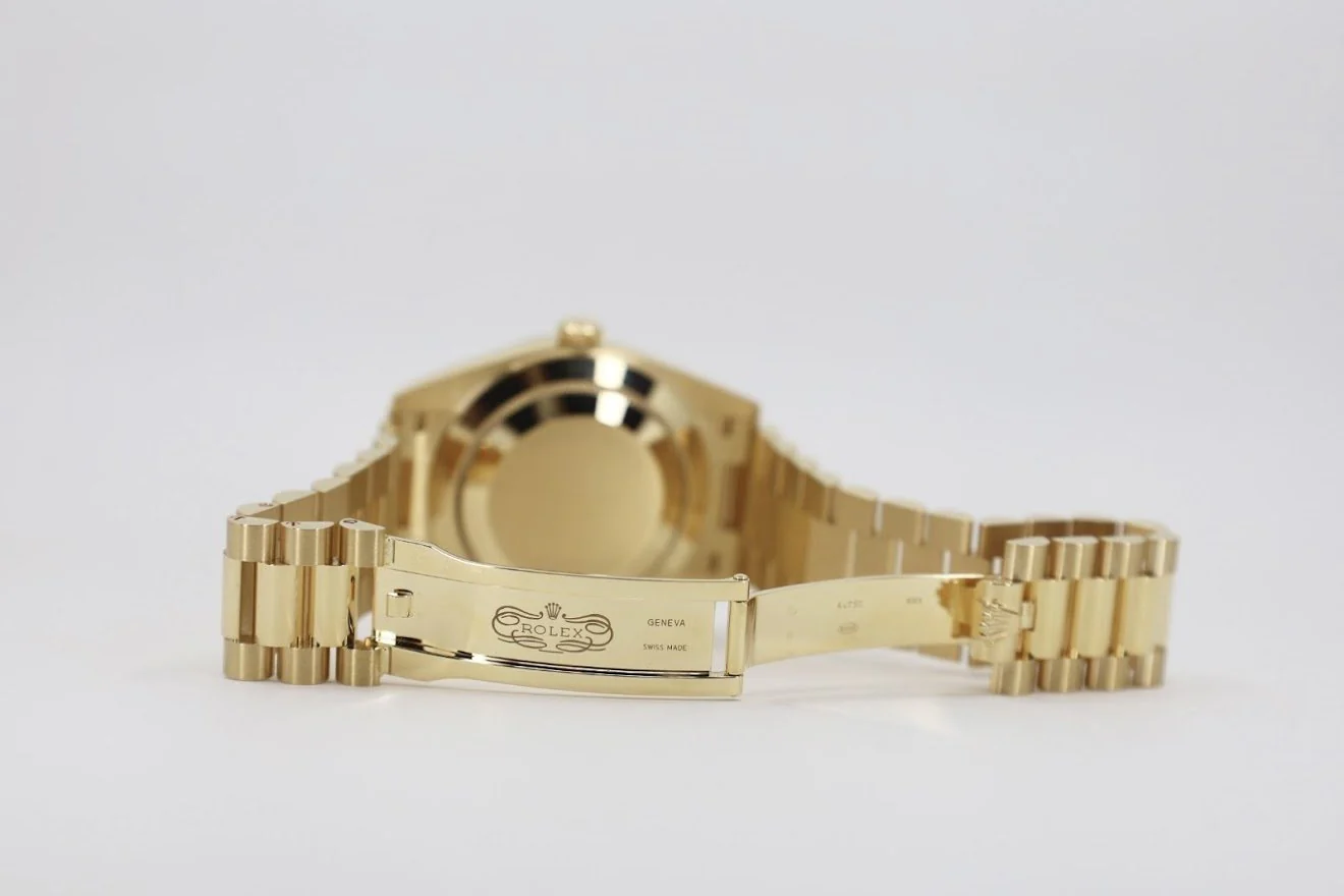 rolex-day-date-40-yellow-gold-black-diagonal-motif-index-dial-fluted-bezel-president-bracelet-228238-151195_1024x1024@2x