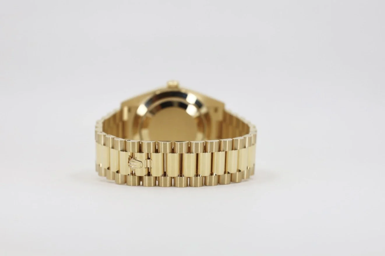 rolex-day-date-40-yellow-gold-black-diagonal-motif-index-dial-fluted-bezel-president-bracelet-228238-336299_1024x1024@2x