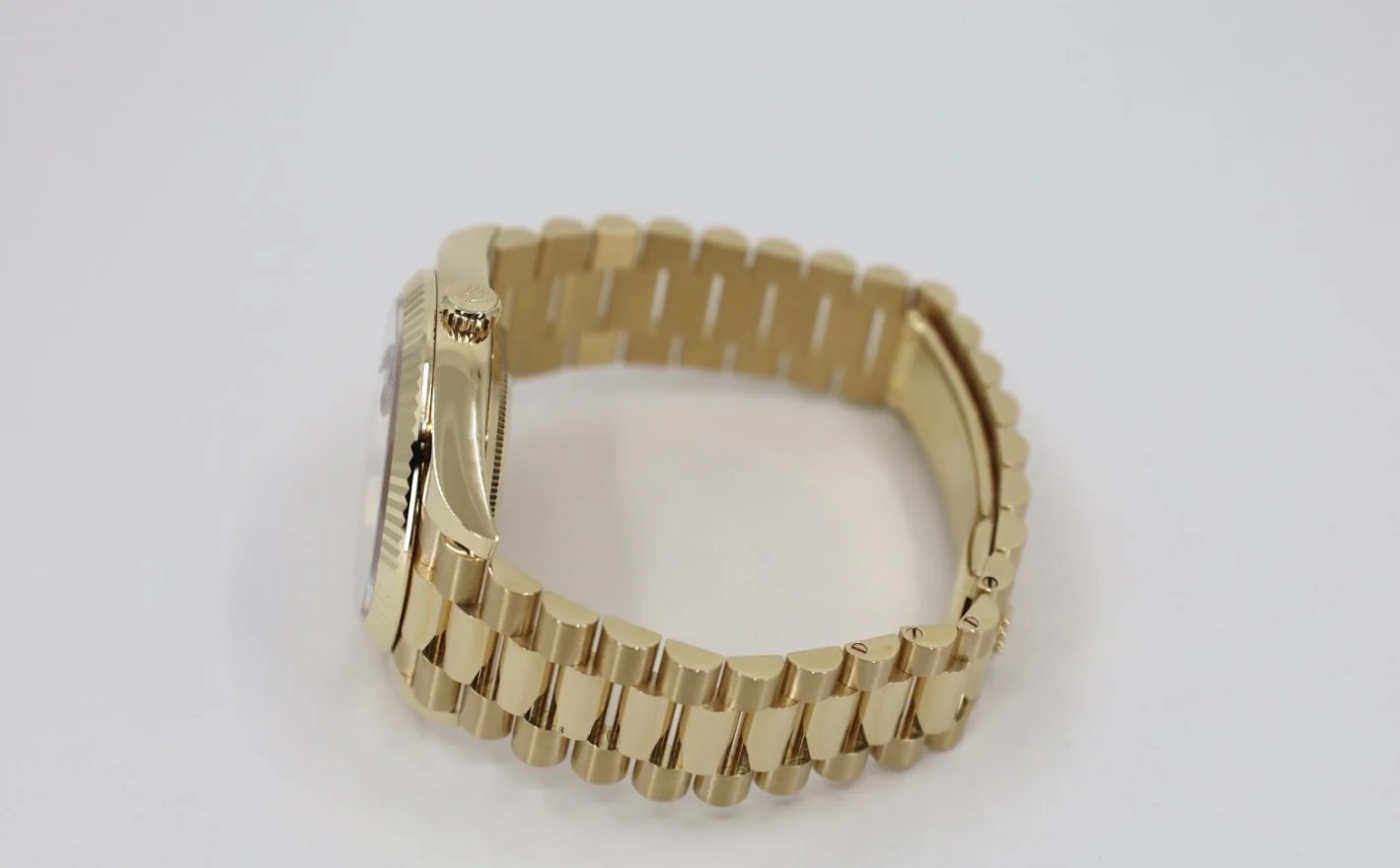 rolex-day-date-40-yellow-gold-black-diagonal-motif-index-dial-fluted-bezel-president-bracelet-228238-616956_1024x1024@2x