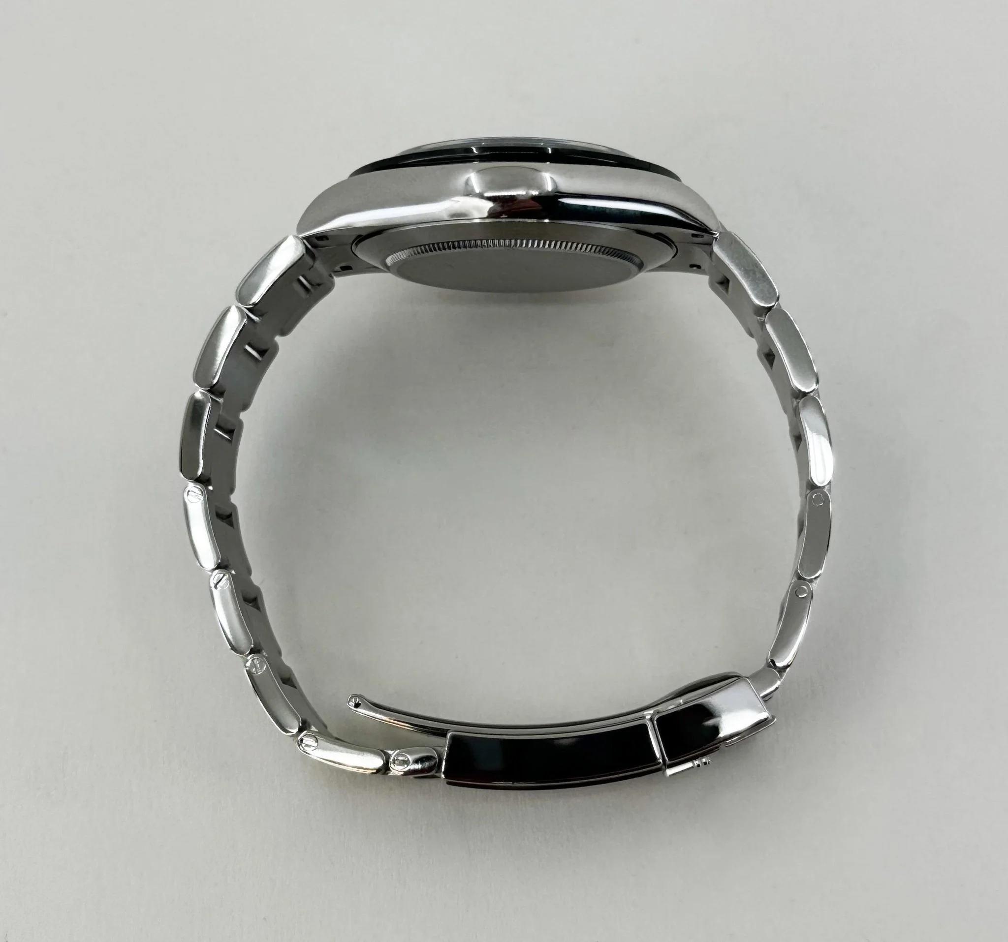 rolex-daytona-stainless-steel-black-index-dial-ceramic-bezel-oyster-bracelet-116500ln-530031_1024x1024@2x