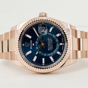 rolex-everose-gold-sky-dweller-watch-fluted-ring-command-bezel-blue-green-index-dial-oyster-bracelet-206590_1024x1024@2x