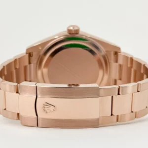 rolex-everose-gold-sky-dweller-watch-fluted-ring-command-bezel-blue-green-index-dial-oyster-bracelet-294141_1024x1024@2x