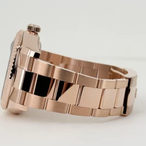 rolex-everose-gold-sky-dweller-watch-fluted-ring-command-bezel-blue-green-index-dial-oyster-bracelet-557422_1024x1024@2x